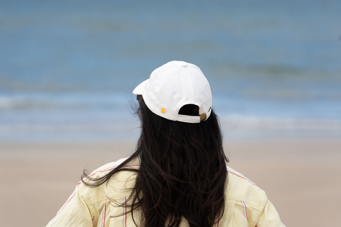 White 'Staying Afloat' adult hat, a stylish accessory for parents embracing a relaxed lifestyle.