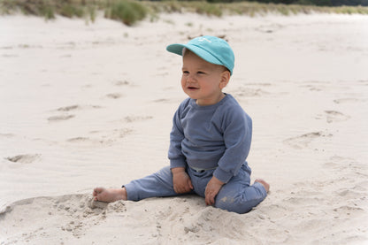 Fun 'Free Range Kid' hat for children, a perfect accessory for young adventurers.
