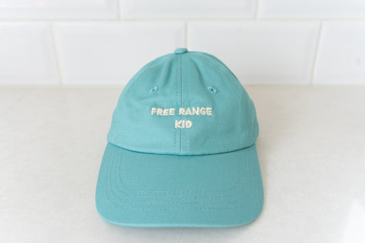 Kids' hat with 'Free Range Kid' text, perfect for adventurous children who love the outdoors.