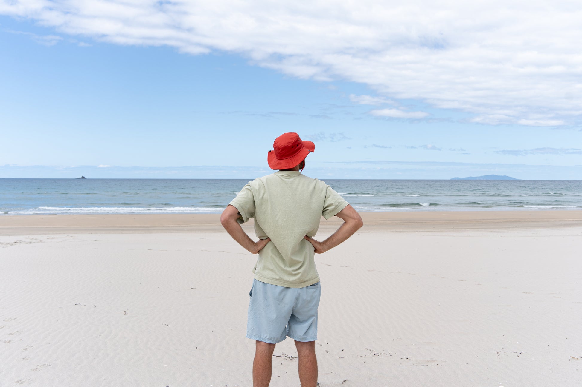 Adult-sized 'No Hat No Play' bucket hat in red, a must-have for sun safety and casual style.