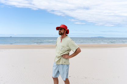 Adult-sized 'No Hat No Play' bucket hat in red.